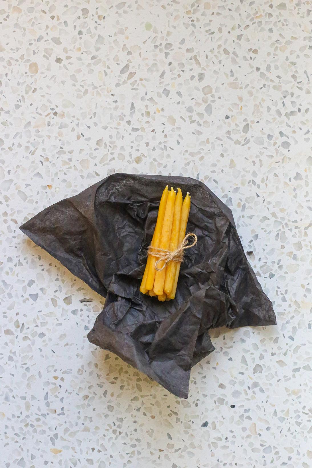 unwrapped beeswax birthday candles