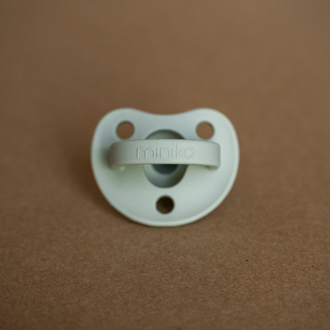 minika sage coloured silicone pacifier
