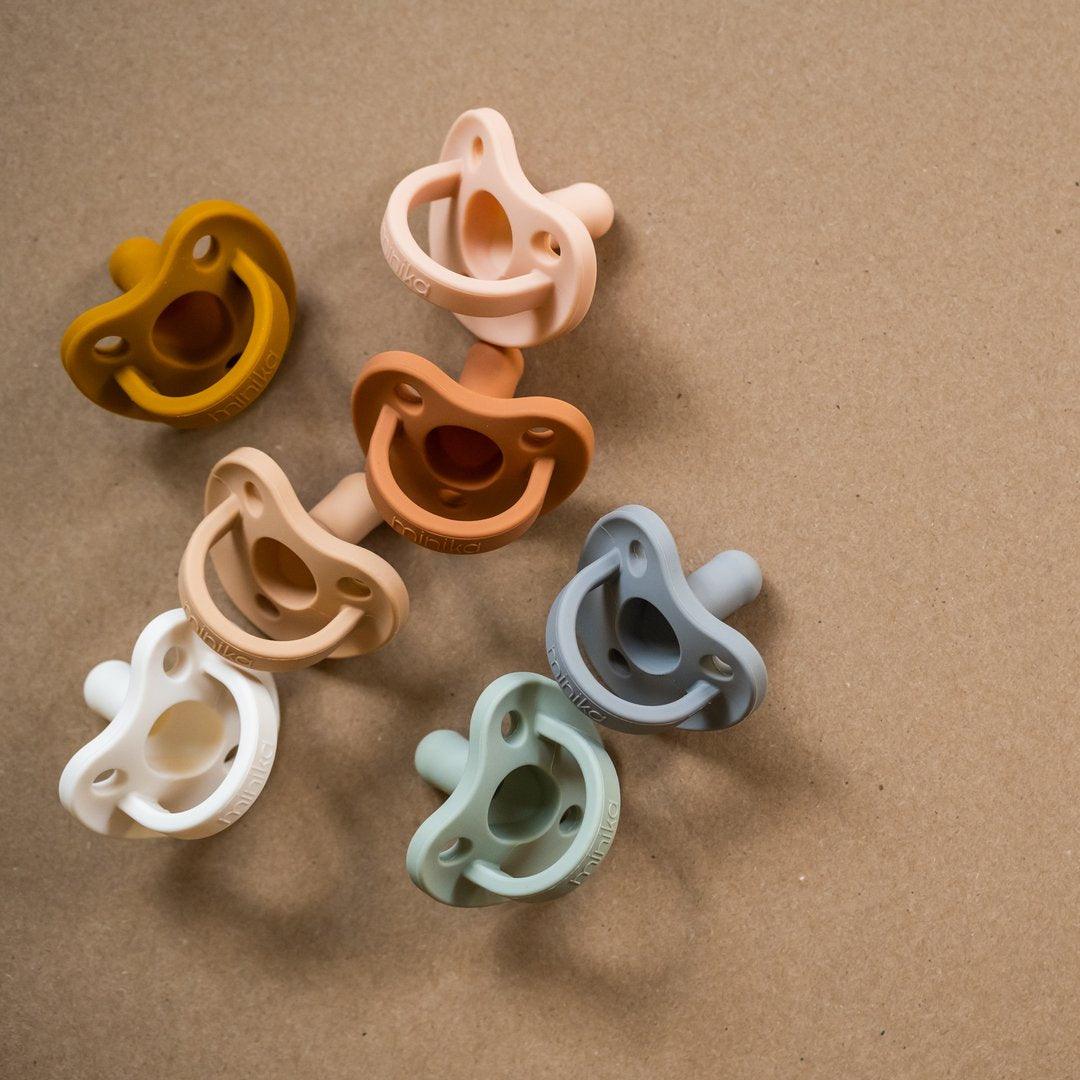 Minika silicone pacifiers, all colours